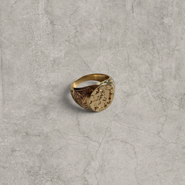 Vintage style gold colour stainless steel signet ring with engraved lion emblem