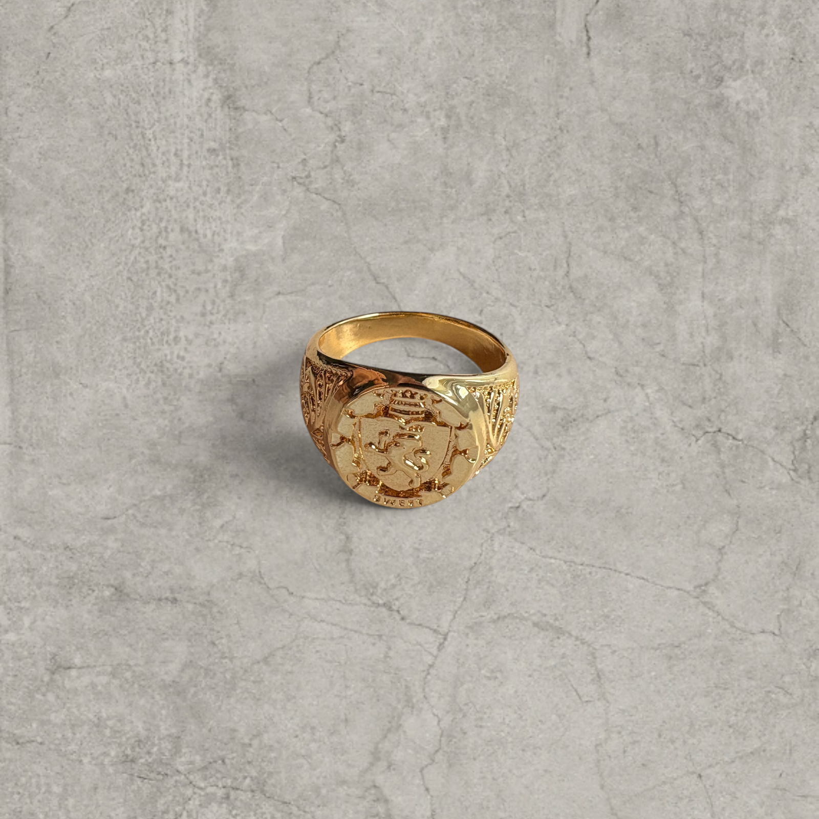 Vintage style gold colour stainless steel signet ring with engraved lion emblem