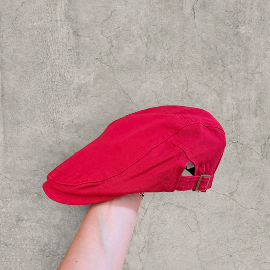 Plaid flat peak beret cap adjustable buckle in red with Boston logo.