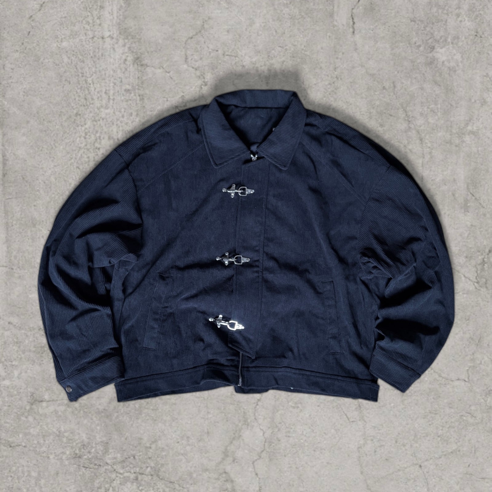 Military style corduroy bomber jacket with silver clasps in black