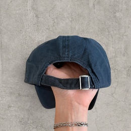Baseball cap with Sunday Running Club logo in black.