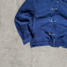 Collared bomber jacket with silver clasp fastenings in navy blue