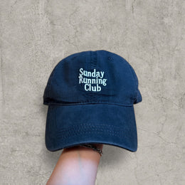 Vintage style baseball cap with white Running logo in black