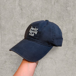 Vintage style baseball cap with white Running logo in black