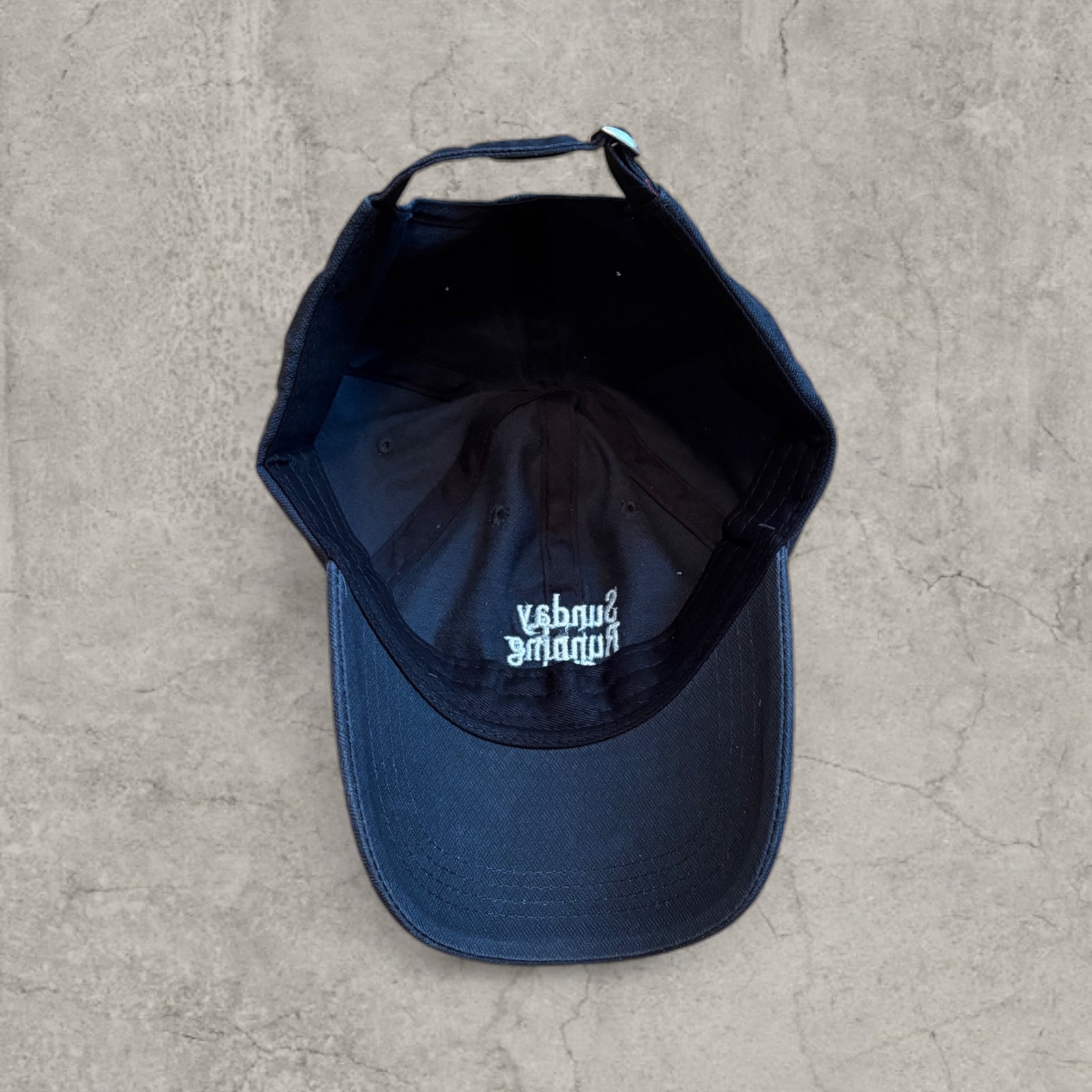 Vintage style baseball cap with white Running logo in black