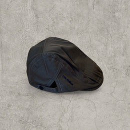 Flat cap in khaki green with black embroidery