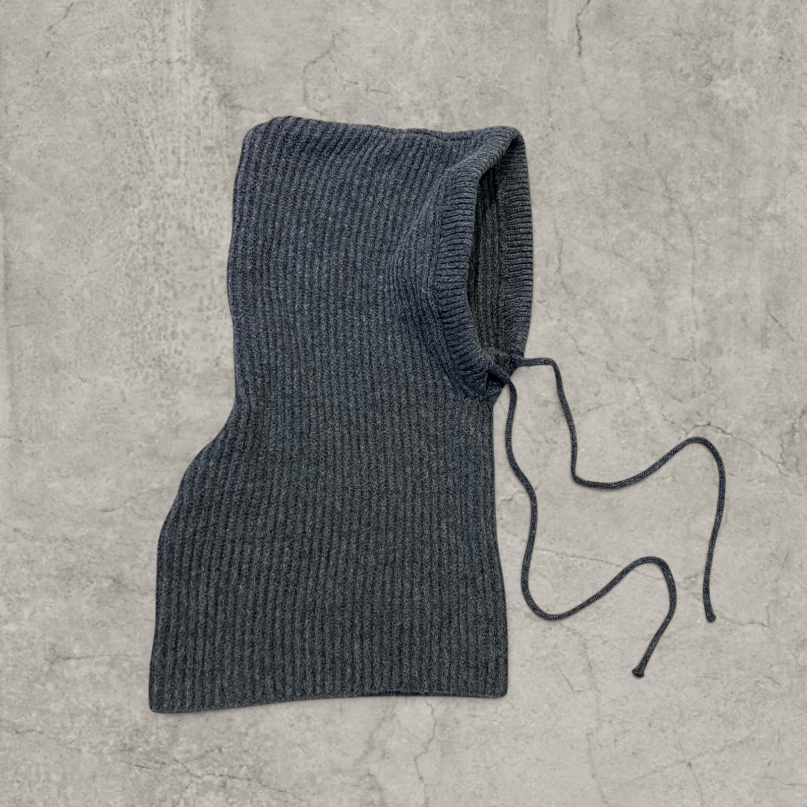 Knitted hooded snood scarf bonnet hat with drawstring in dark grey.