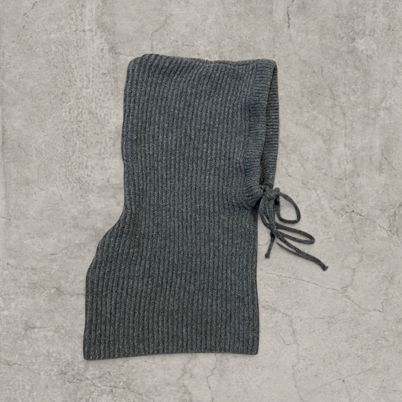 Knitted hooded snood scarf bonnet hat with drawstring in dark grey.