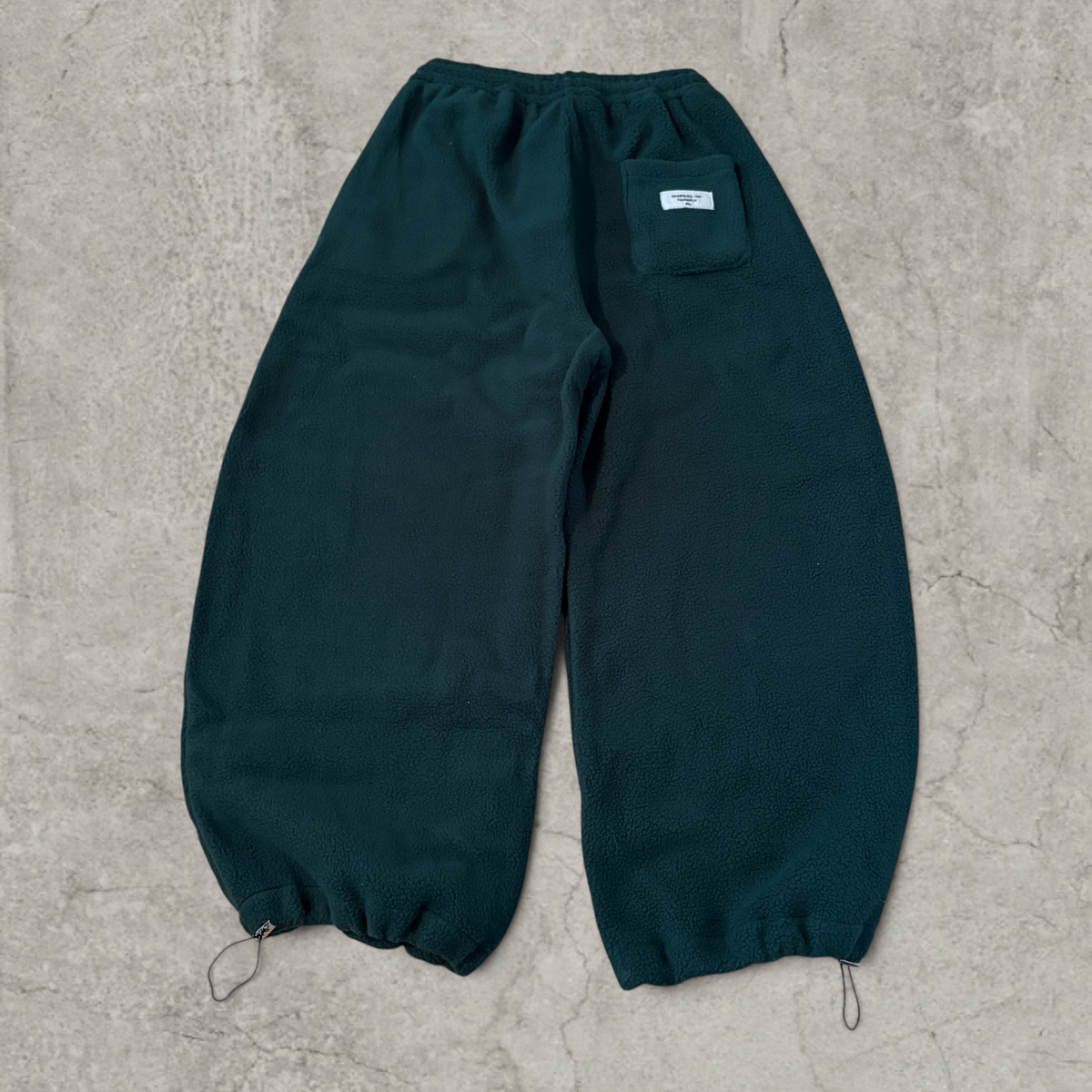 Super baggy wide leg Korean fleece joggers in dark green.