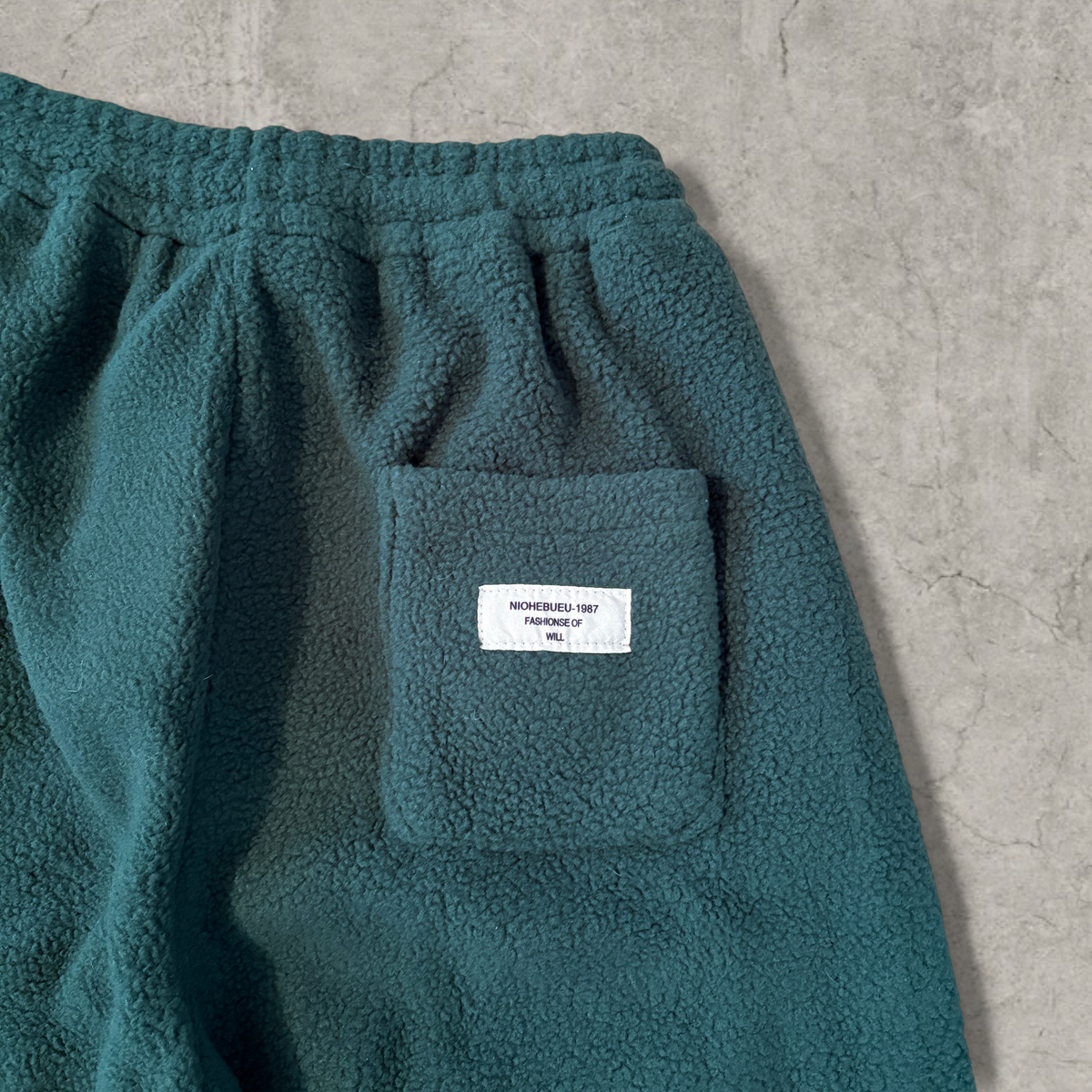 Super baggy wide leg Korean fleece joggers in dark green.