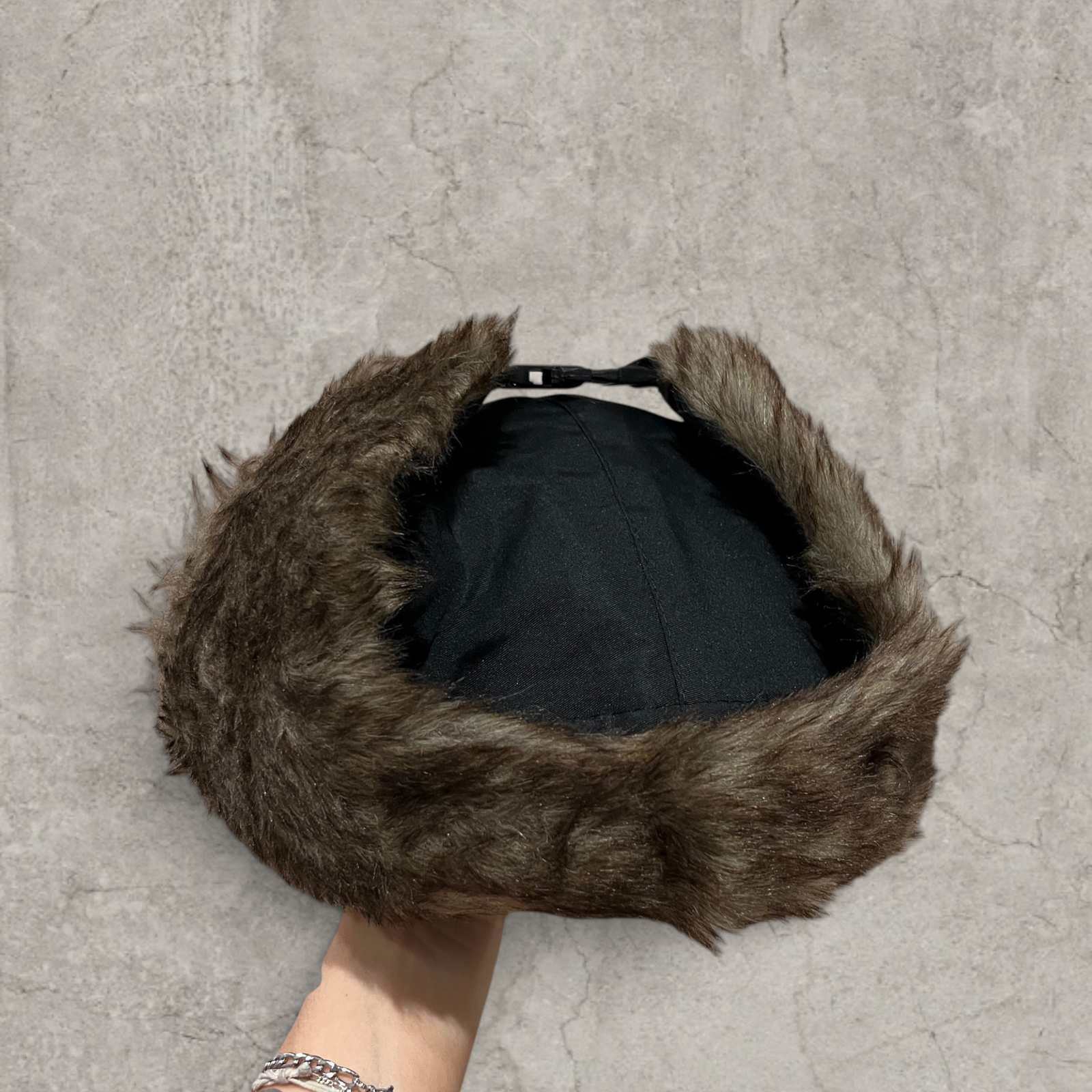 Russian ushanka hat in black with grey faux fur.