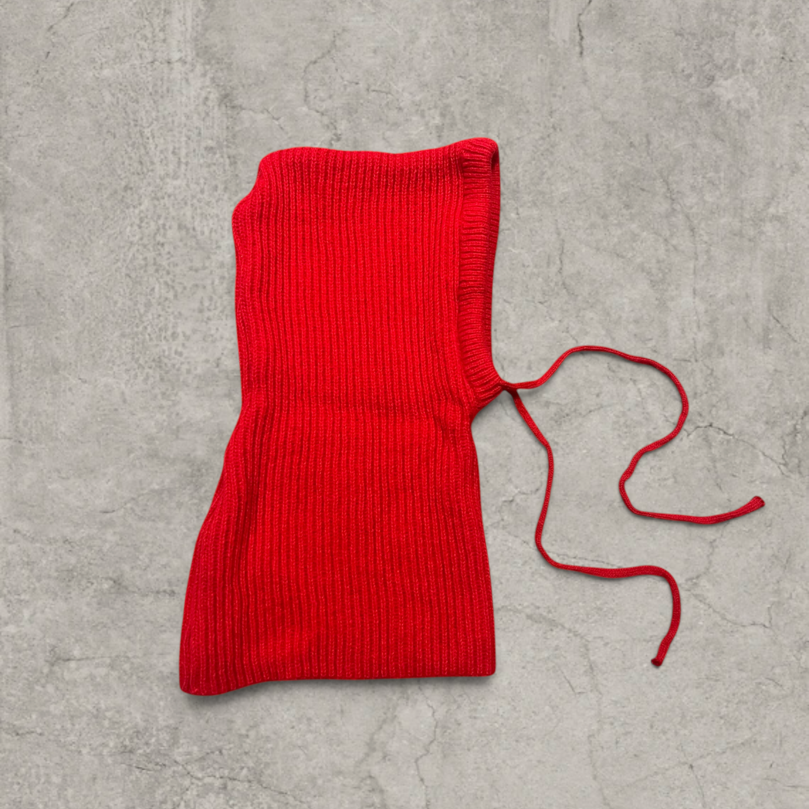 Knitted hooded snood scarf bonnet hat with drawstring in red.