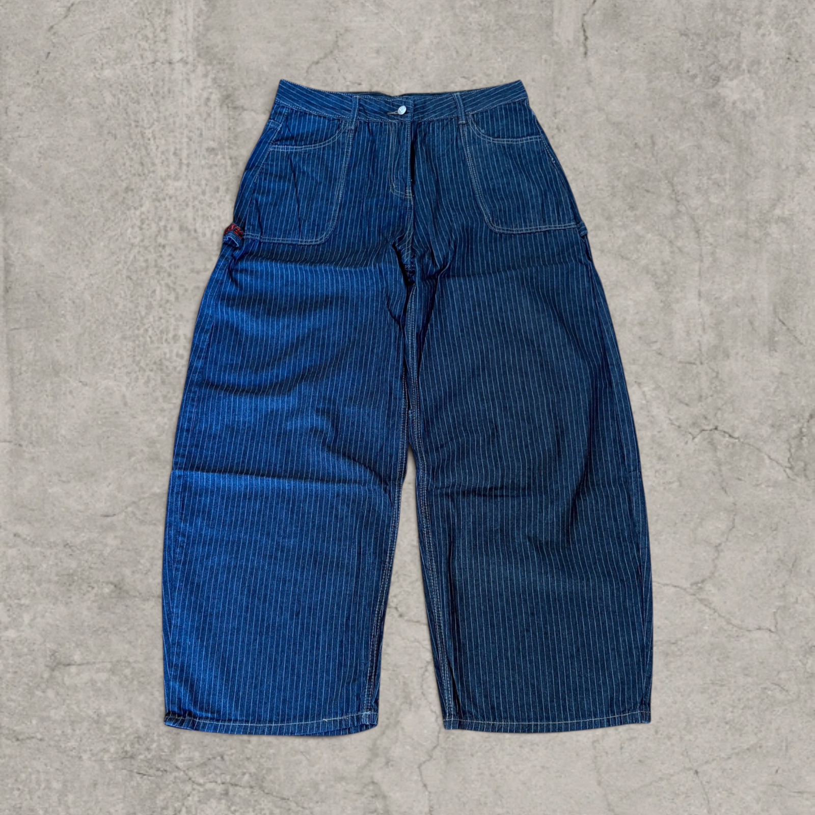 Wide-leg skater jeans with pinstripe pattern in navy blue.