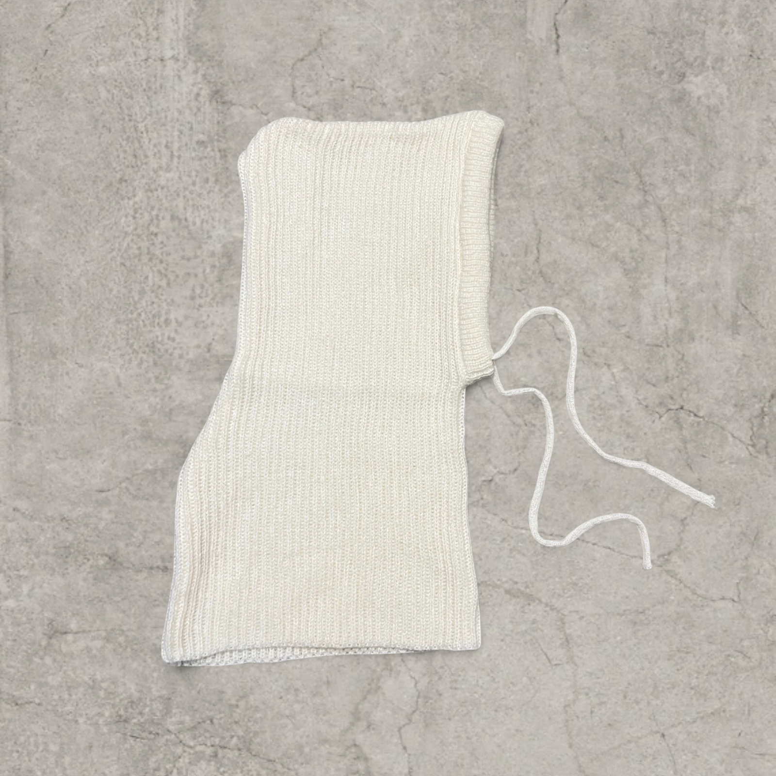 Knitted hooded snood scarf bonnet hat with drawstring in Cream.