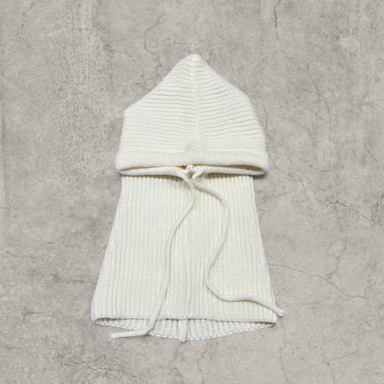 Knitted hooded snood scarf bonnet hat with drawstring in Cream.