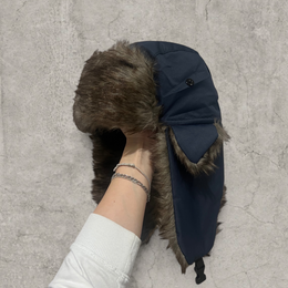 Russian ushanka hat in navy blue with grey faux fur.