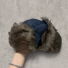 Russian ushanka hat in navy blue with grey faux fur.