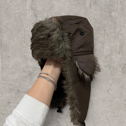 Russian ushanka hat in brown with grey faux fur.