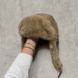 Russian ushanka hat in beige/brown with beige/tan faux fur.