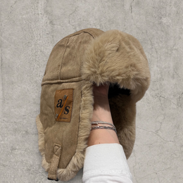 Russian ushanka hat in beige/brown with beige/tan faux fur.
