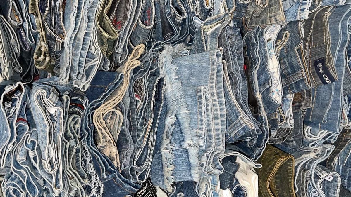 Folded blue vintage jeans stacked