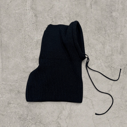 Knitted hooded snood scarf bonnet hat with drawstring in black.