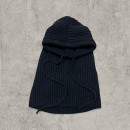 Knitted hooded snood scarf bonnet hat with drawstring in black.