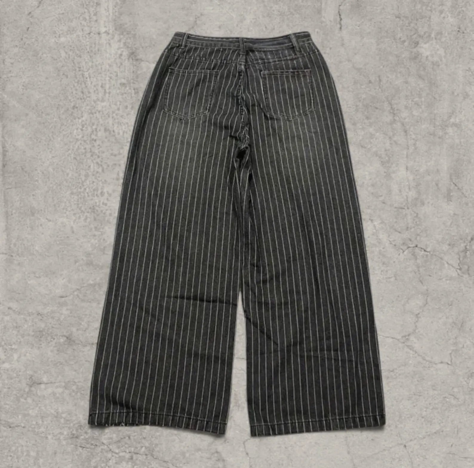 Insane baggy relaxed fit jeans in washed black with white pinstripe.