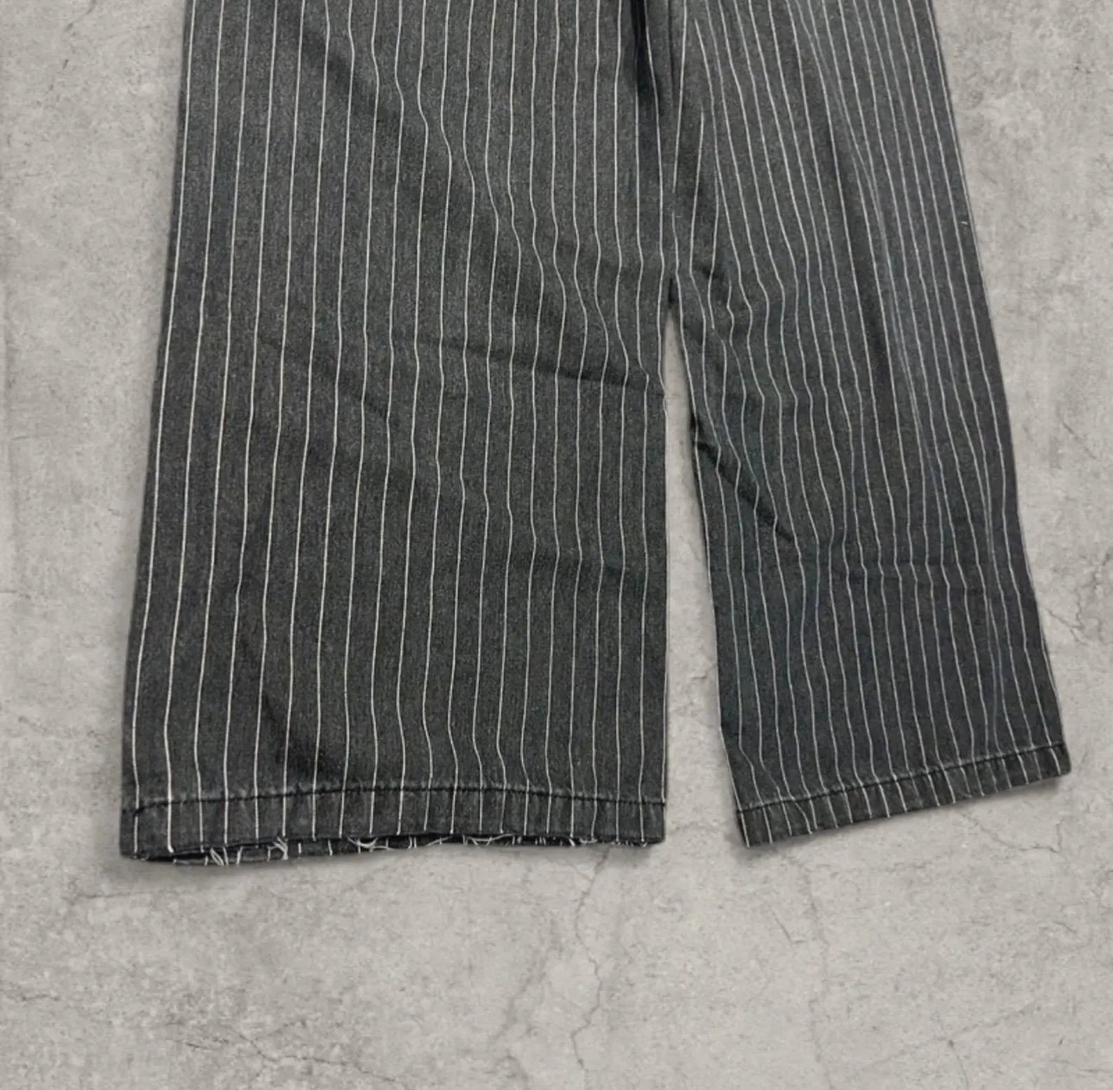 Insane baggy relaxed fit jeans in washed black with white pinstripe.