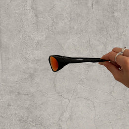 Insane UV400 sunglasses in black with orange/red reflective lense. One size.