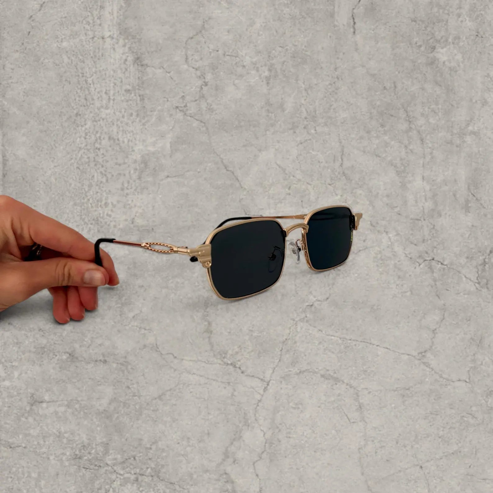 Insane UV400 sunglasses in gold grey with black lense. One size.