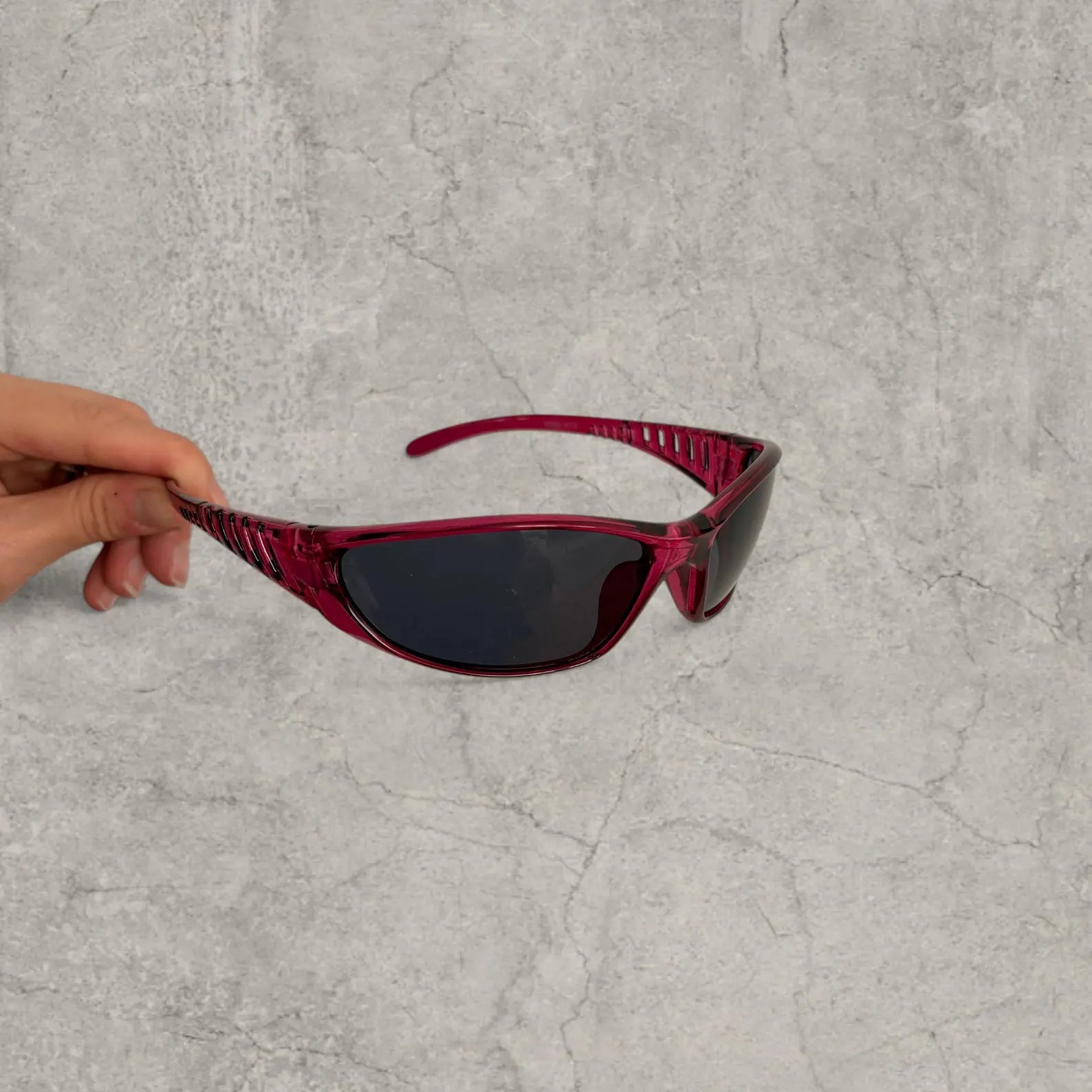 Insane UV400 sunglasses in burgundy red with black lense. One size.