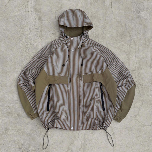Insane skate khaki green/brown striped gorpcore jacket with hood, zip up and toggle.