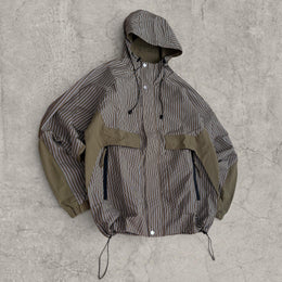 Insane skate khaki green/brown striped gorpcore jacket with hood, zip up and toggle.