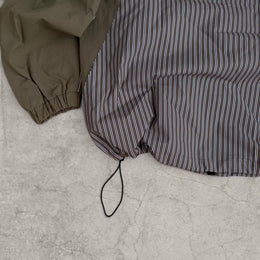 Insane skate khaki green/brown striped gorpcore jacket with hood, zip up and toggle.