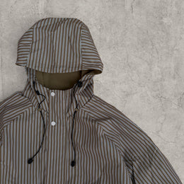Insane skate khaki green/brown striped gorpcore jacket with hood, zip up and toggle.