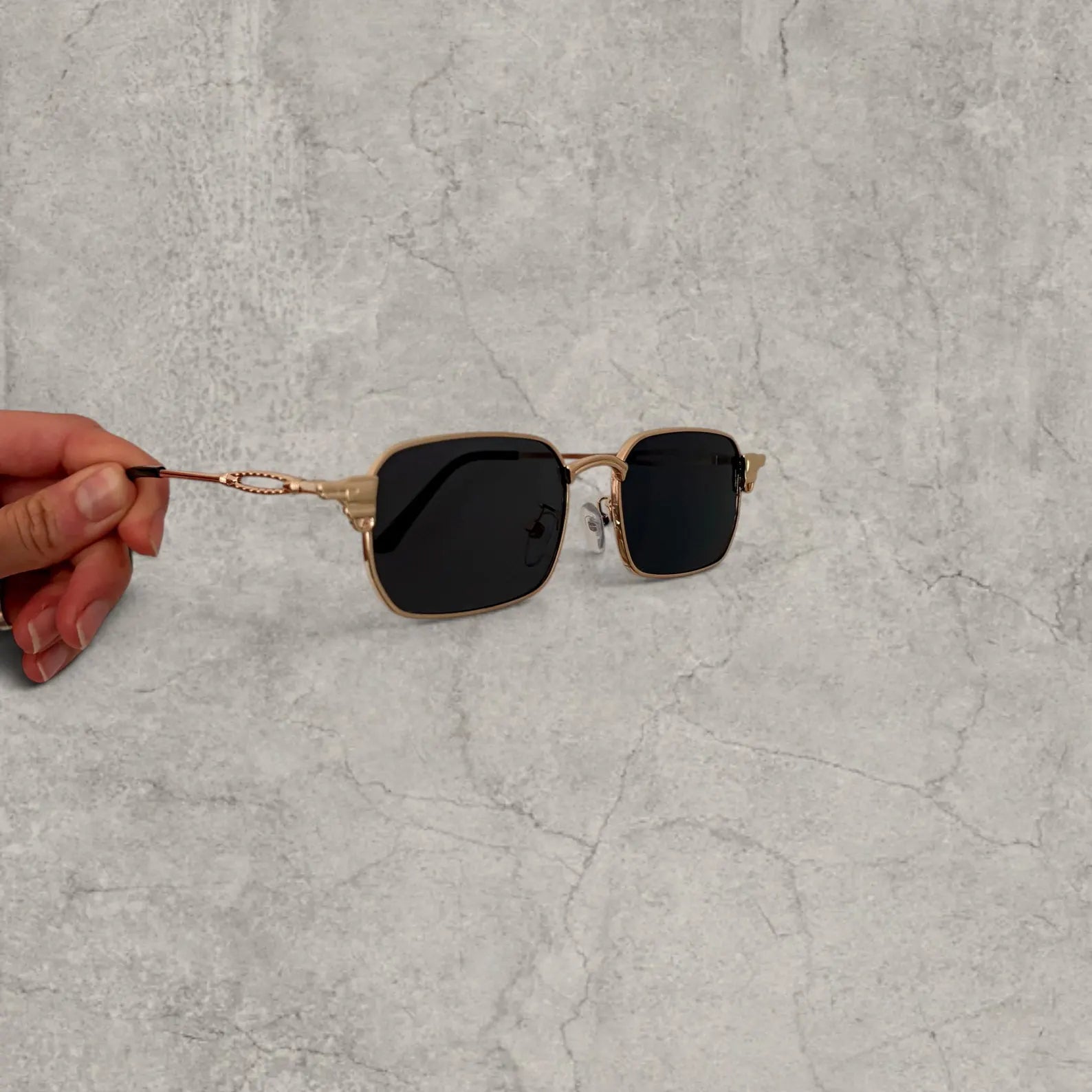 Insane UV400 sunglasses in gold grey with black lense. One size.