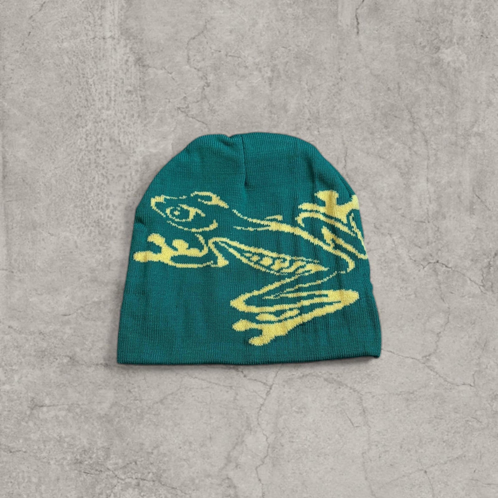Cool Japanese vintage style beanie hat in green with yellow frog graphic design. One size.