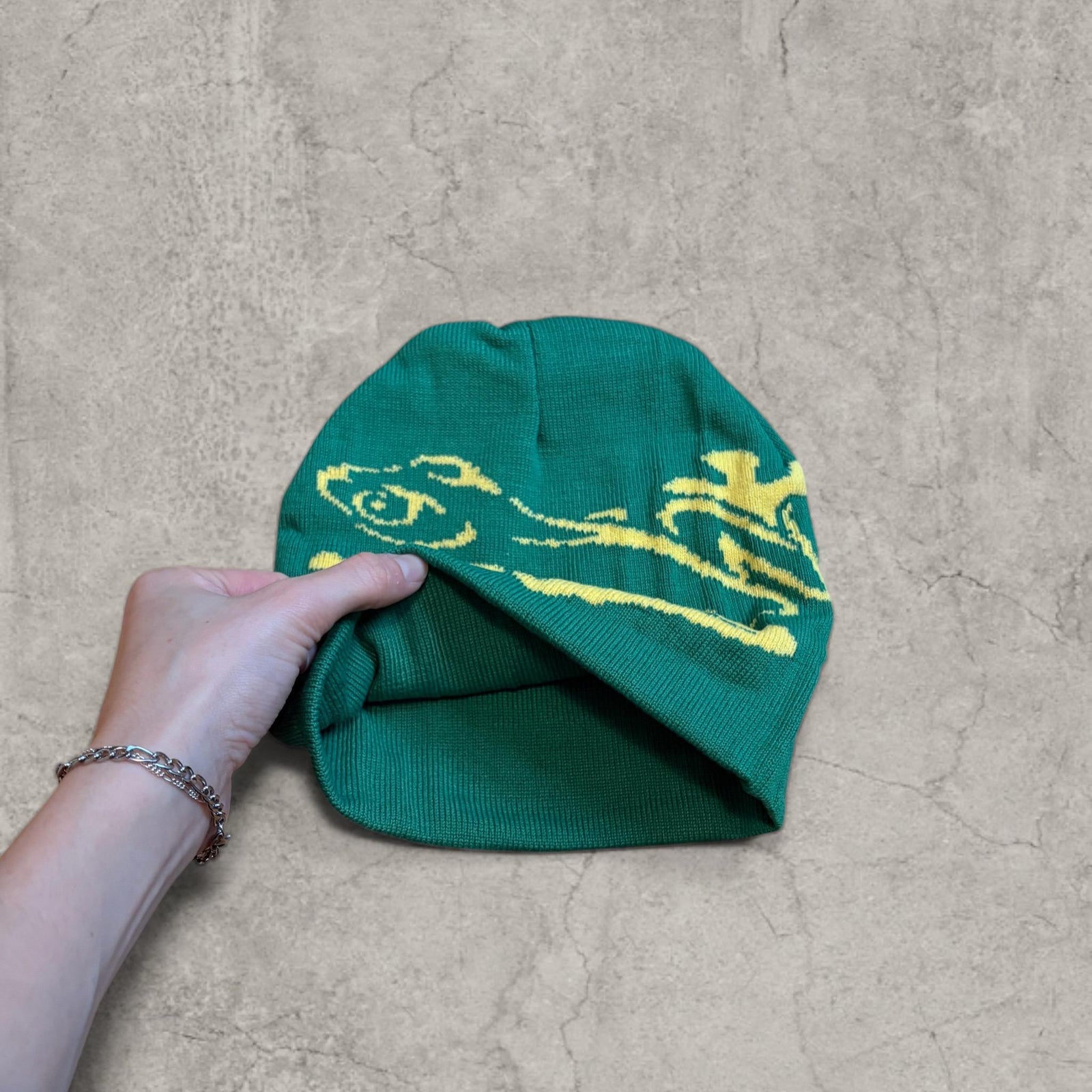 Cool Japanese vintage style beanie hat in green with yellow frog graphic design. One size.