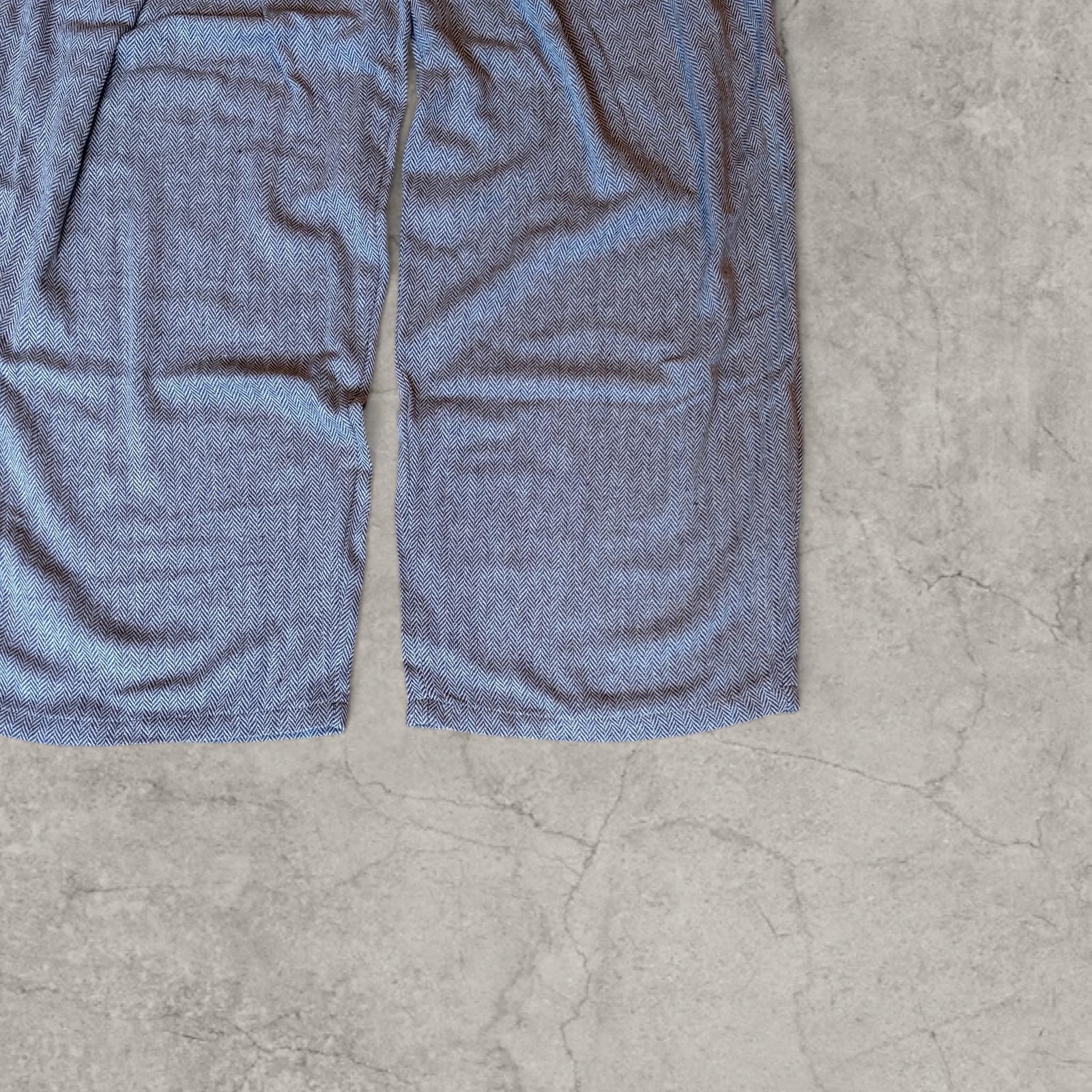 Insane baggy relaxed fit tailored trousers in grey/beige with herringbone.
