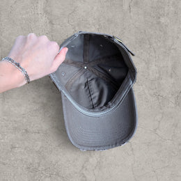 Vintage style baseball cap in beige grey with white embroidery. One size