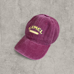 Vintage style baseball cap with yellow camel logo in burgundy