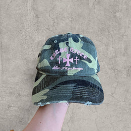 Vintage style baseball cap in khaki green camo print with pink gothic logo