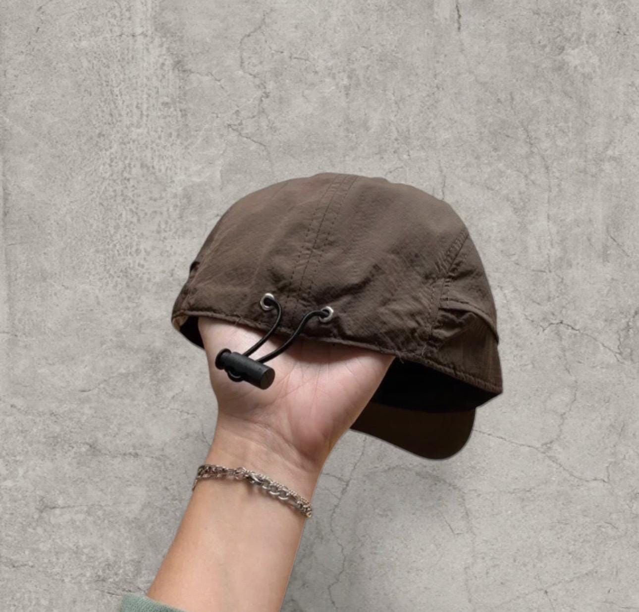 Vintage Korean hiking cap with water-resistant finish in camel