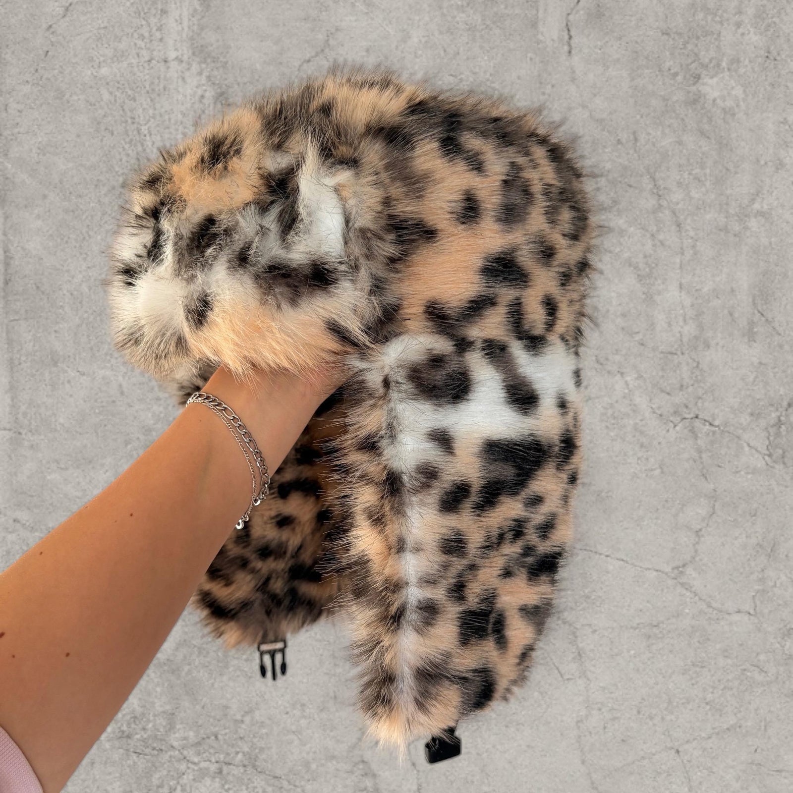 Russian Ushanka fluffy winter hat in cream beige leopard print with faux fur fluff. One size.