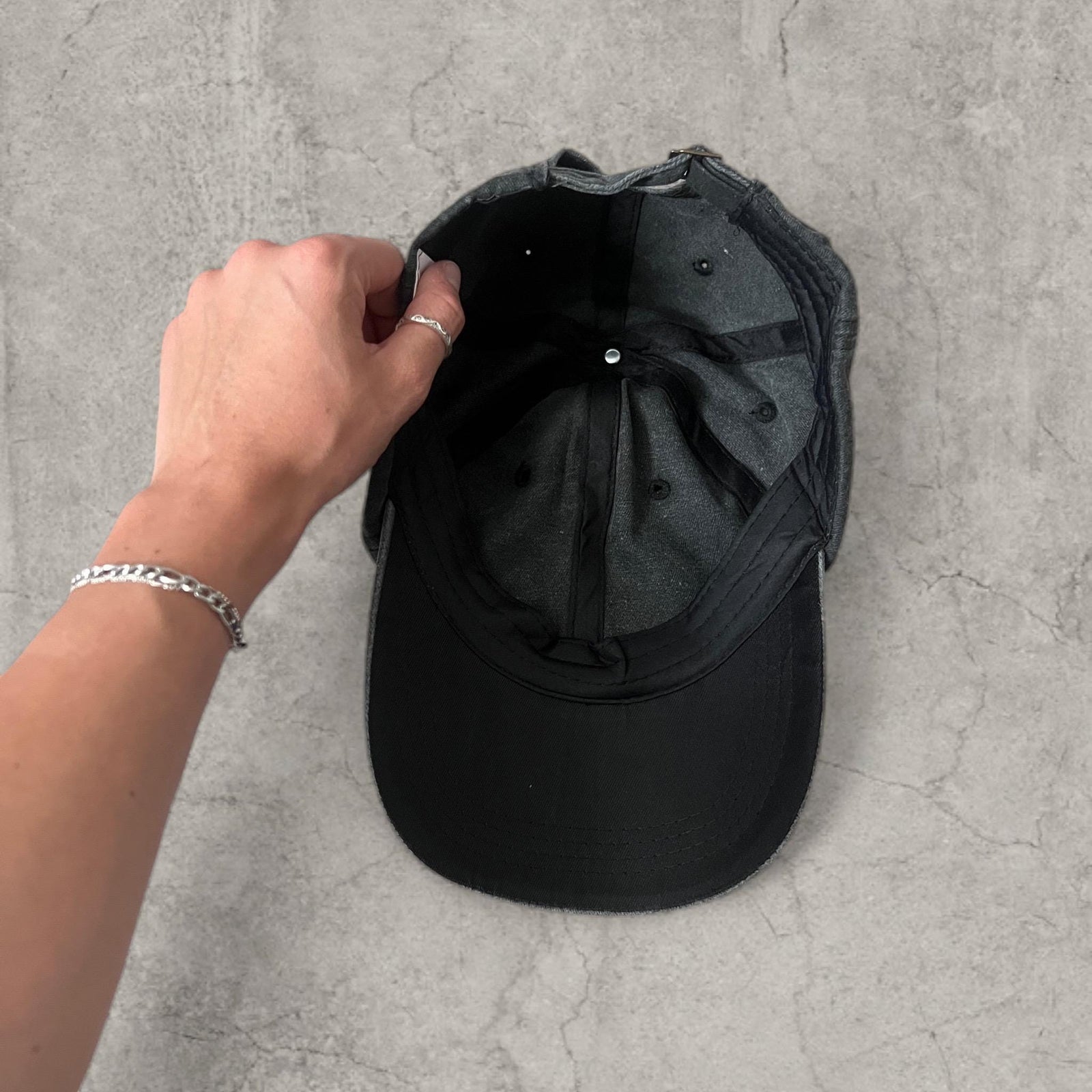 Vintage style baseball cap in black with red white castrol oil petrol logo.
