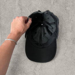 Vintage style baseball cap in black with red white castrol oil petrol logo.