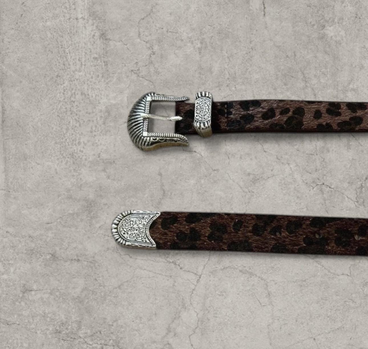 Vintage style faux leather western cowboy belt in brown leopard with silver trim. 103cm.