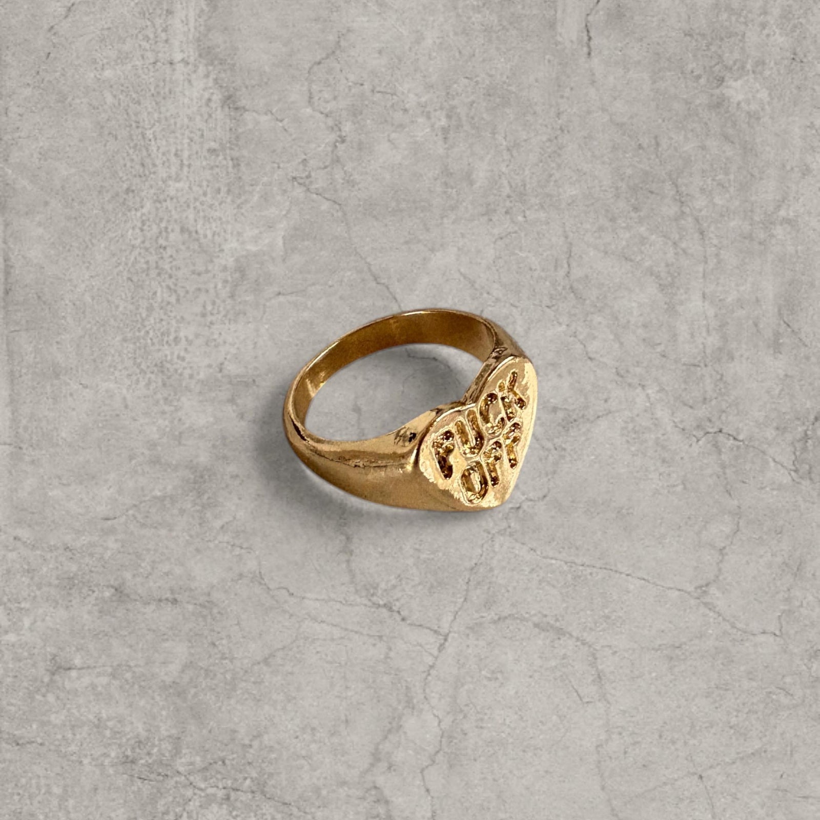 Cool vintage style gold colour stainless steel signet ring with F OFF. One size.