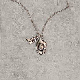Cool vintage style Western cowboy necklace in stainless steel silver colour pendant. One size.